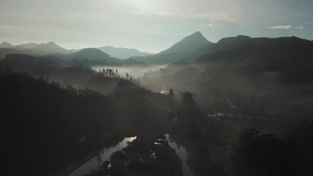 Aerial view of the dawn and the mountains near the city of Munnar. Kerala. India.