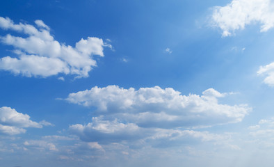 Naklejka na ściany i meble Blue sky with white clouds. Blue sky background with clouds.