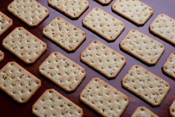 Crackers on wooden table