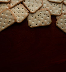 Crackers on wooden table