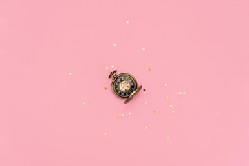 Ringing twin bell vintage classic alarm clock Isolated on pink pastel colorful trendy background....