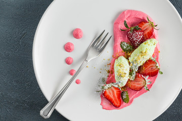 Strawberry dessert with mint.