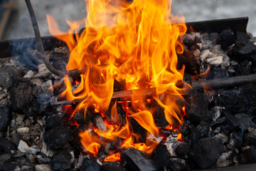 Heating of metal billets on the fire.