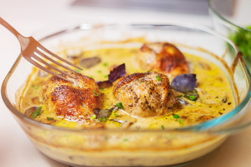 Oven baked chicken legs in wine sauce