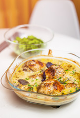 Oven baked chicken legs in wine sauce