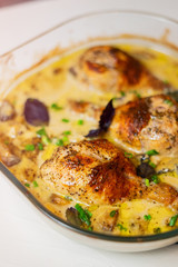Oven baked chicken legs in wine sauce