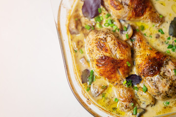 Oven baked chicken legs in wine sauce