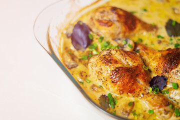 Oven baked chicken legs in wine sauce