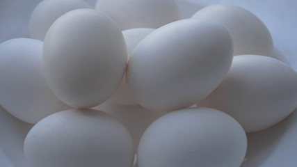 white eggs on a white plate on a plate