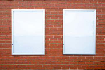 Blank advertising panels on outside shop wall