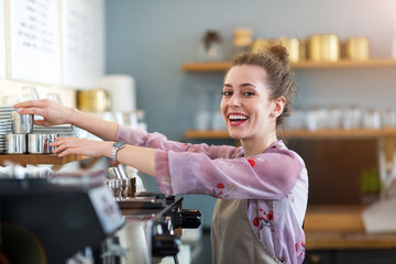 Woman working in coffee shop