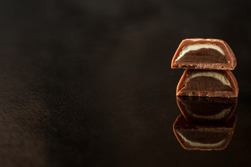 chocolate, sweets with filling - cut. top food background. copy space