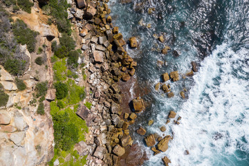Overhead view of a dramatic rocky coastline at Manly in Sydney NSW Australia