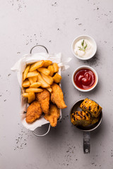Lunch or dinner - chicken strips, french fries, corn and dips