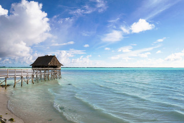 Small hut on a sunny day and blue sky, Kiribati, Micronesia in the central Pacific Ocean