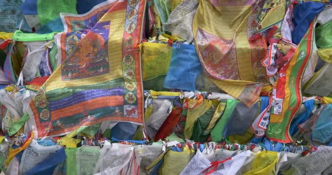 Colorful Tibetan prayer flags swaying in the wind in the temple, Ulan Ude Russia