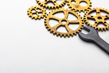 Top closeup view of gear wheel on white background with blank space for text. Top view, flat lay.