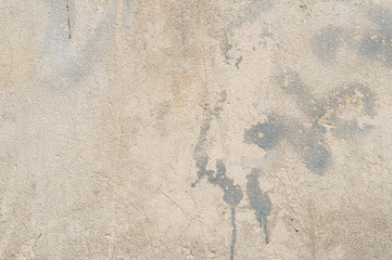 Old concrete background texture with some cracked and stained parts on it