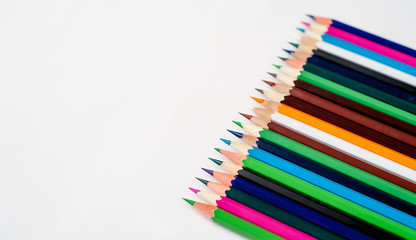 Colored pencils on a white background, with space for your text, blank for banner