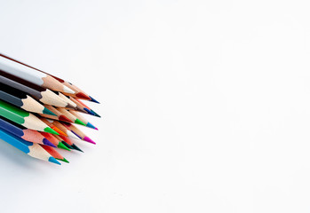 Colored pencils on a white background, with space for your text, blank for banner