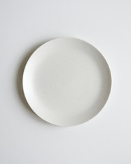 White ivory plate . Festive table setting for holiday. On a white background  from above. Top view. Tableware. Isolated.