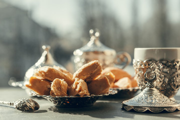 Turkish sweets with coffee on a wooden table