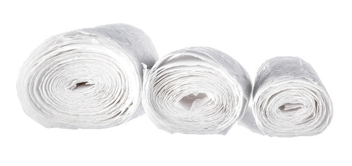 Roll of toilet paper on white background