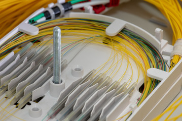 Splicing the fibers on spice tray close-up