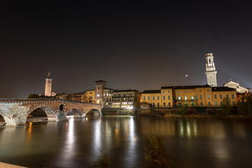 Fototapeta premium Ponte Pietra and Adige River at night - Verona Italy
