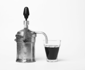 Metallic old coffee machine isolated