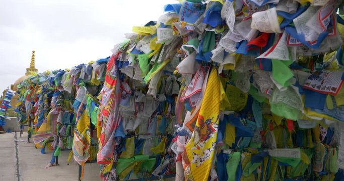 Colorful Tibetan prayer flags swaying in the wind in the temple, Ulan Ude Russia