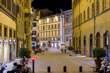 Night at Piazza Santa Trinita - A night view of the Piazza Santa Trinita, with an ancient Roman column known as the Column of Justice standing at the middle of the square. Florence, Tuscany, Italy. 