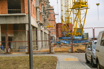 Capital industrial construction of a multi-storey building in the metropolis.