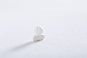 Medicine tablets on white background , Pharmacy theme