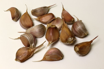 Garlic cloves on white background isolated.