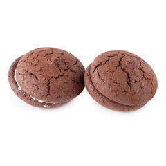 Sandwich chocolate cookies and cream on a white plate isolated over white background