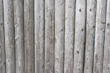 Texture of vertical log fencing