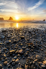 Fototapeta na wymiar Rocks on the Beach at Sunset