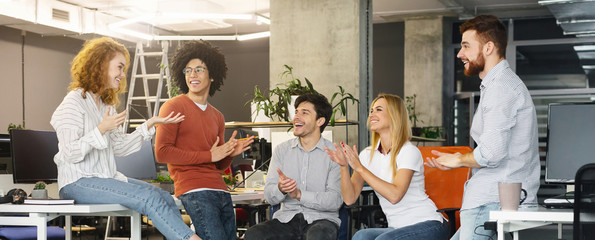 Group multiethnic business people applauding to new member of team