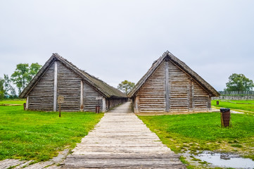 Fototapeta na wymiar The big wooden huts of Biskupin, poland
