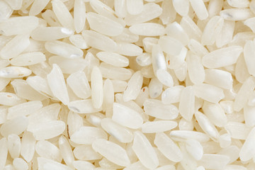 White rice background and texture. Rice grain. View from above. Close-up
