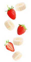 Falling fresh berries and banana isolated on white background