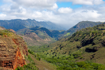 Fototapeta na wymiar A beautiful green landscape of a mountain in hawaii
