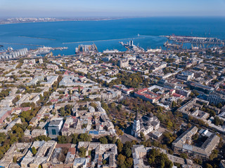 Fototapeta premium Panoramic view of the city of Odessa, from Spaso-Preobrazhensky Cathedral and sea port on a background of blue sky. Ukraine. Aerial view from the drone