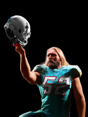 one american football player man studio isolated on black background