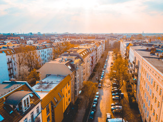 Fototapeta na wymiar Warm light aerial view of European city street