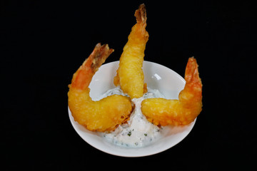 deep fried battered shrimps known as tempura prawns