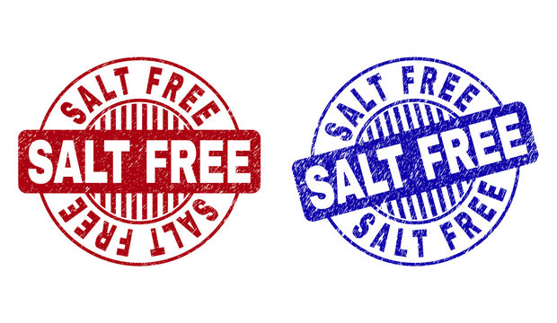 Grunge SALT FREE round stamp seals isolated on a white background. Round seals with distress texture in red and blue colors. Vector rubber overlay of SALT FREE label inside circle form with stripes.