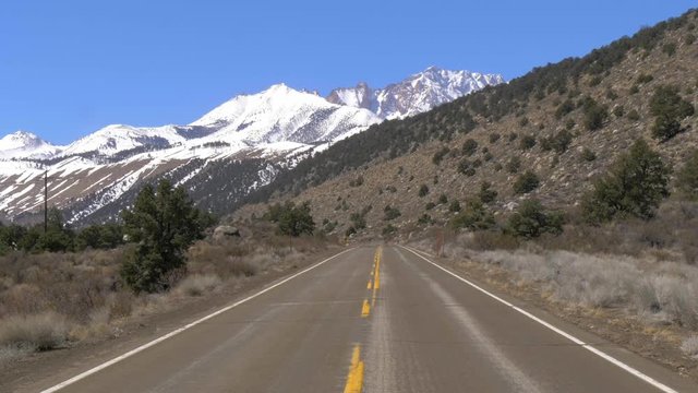 Scenic road through the mountains of Sierra Nevada - travel photography