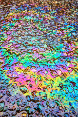 Fototapeta premium Oil Petrol Pollution Rainbow Spill on A Road
